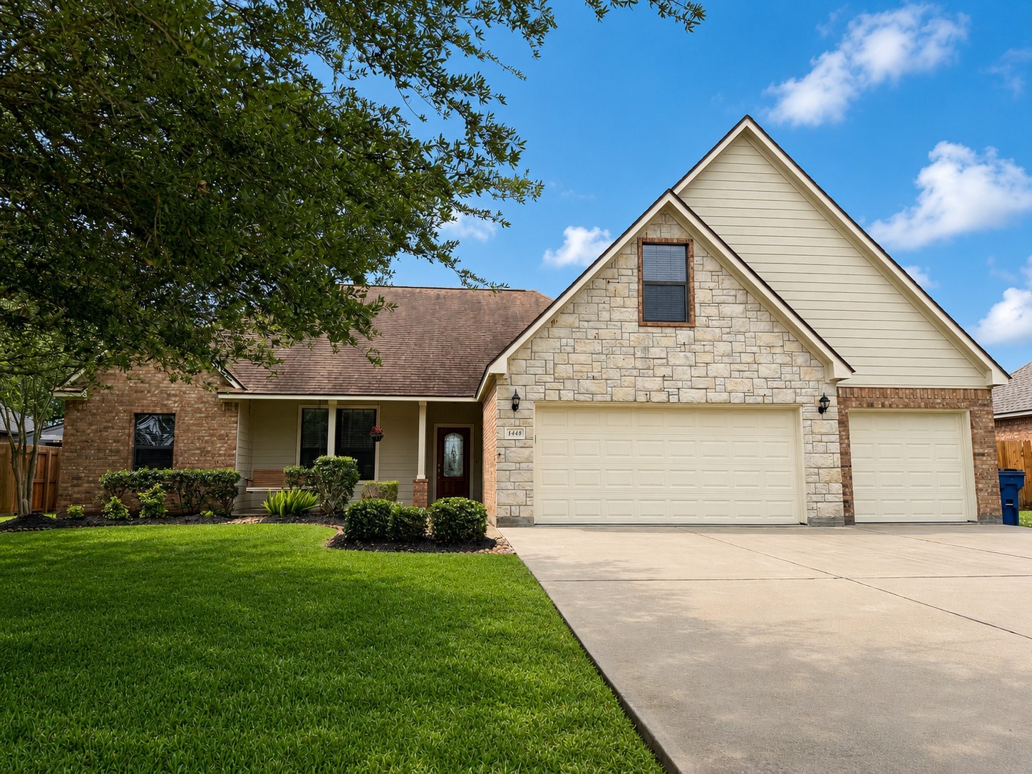 1448 South Blue Bonnet Lane Angleton, TX 77515 - Photo 1 of 43 a front view of house with yard and green space