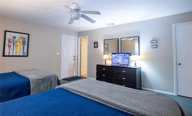 a kitchen with stainless steel appliances granite countertop a refrigerator sink and stove