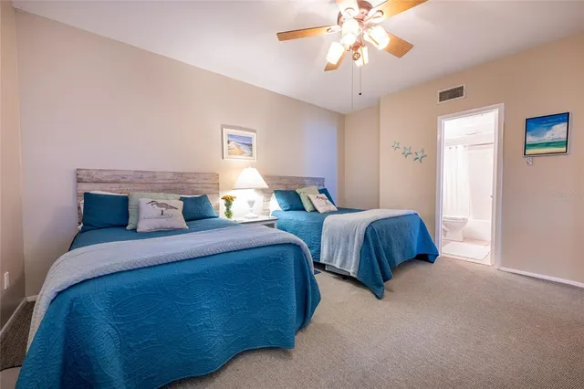 a living room with furniture large window and a flat screen tv