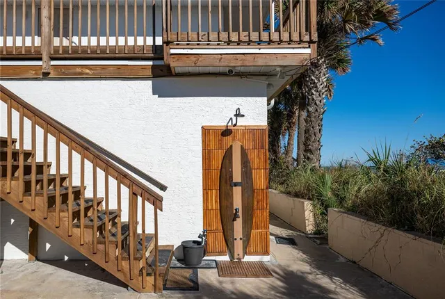 a bedroom with a bed chair and window