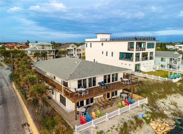 a bed room with two bed and a lamp