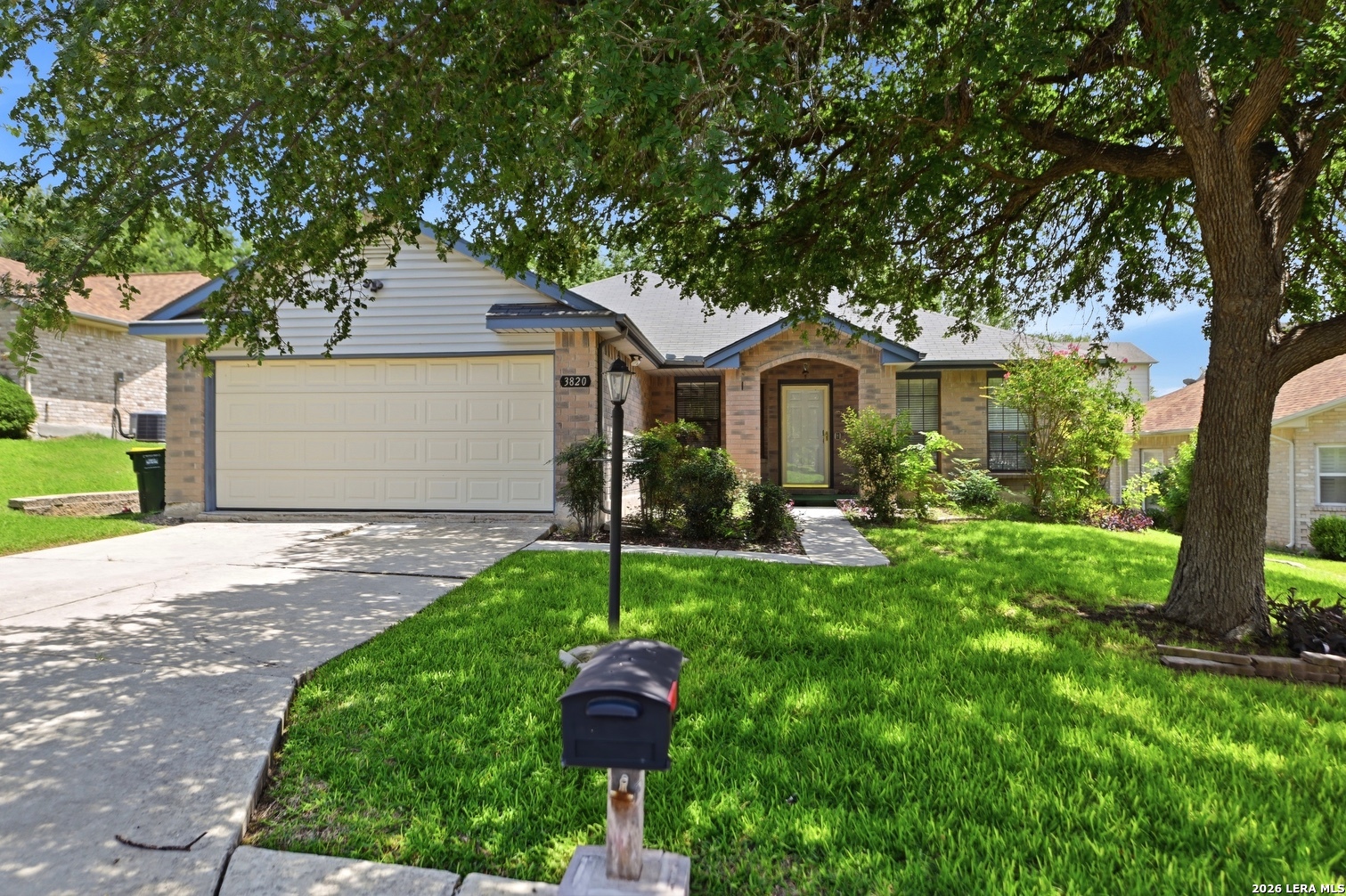 3820 Pheasant Schertz, TX 78108 - Photo 1 of 20 a front view of a house with a yard and garage
