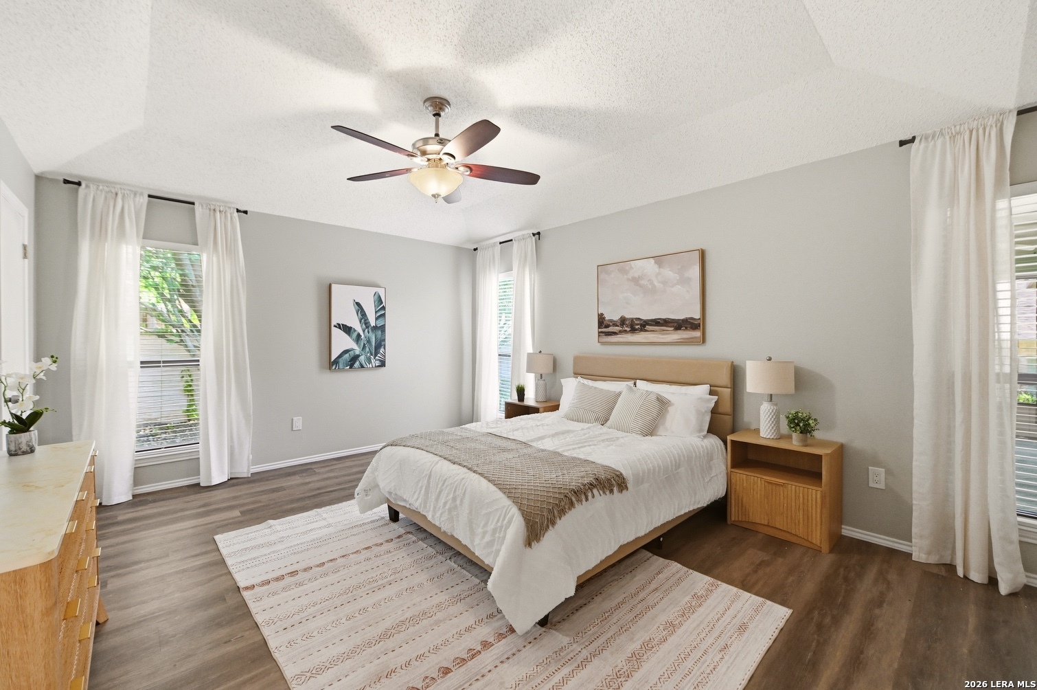 3820 Pheasant Schertz, TX 78108 - Photo 12 of 20 a bedroom with a large bed and a window