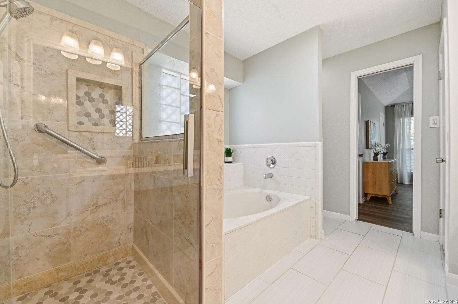 3820 Pheasant Schertz, TX 78108 - Photo 15 of 20 a bathroom with a bathtub and shower