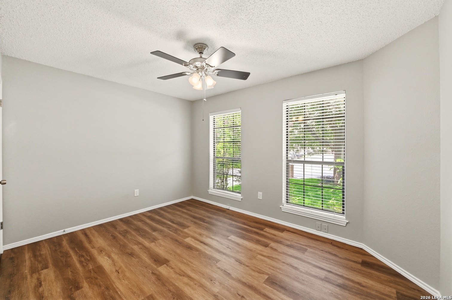 3820 Pheasant Schertz, TX 78108 - Photo 17 of 20 wooden floor in an empty room with a window