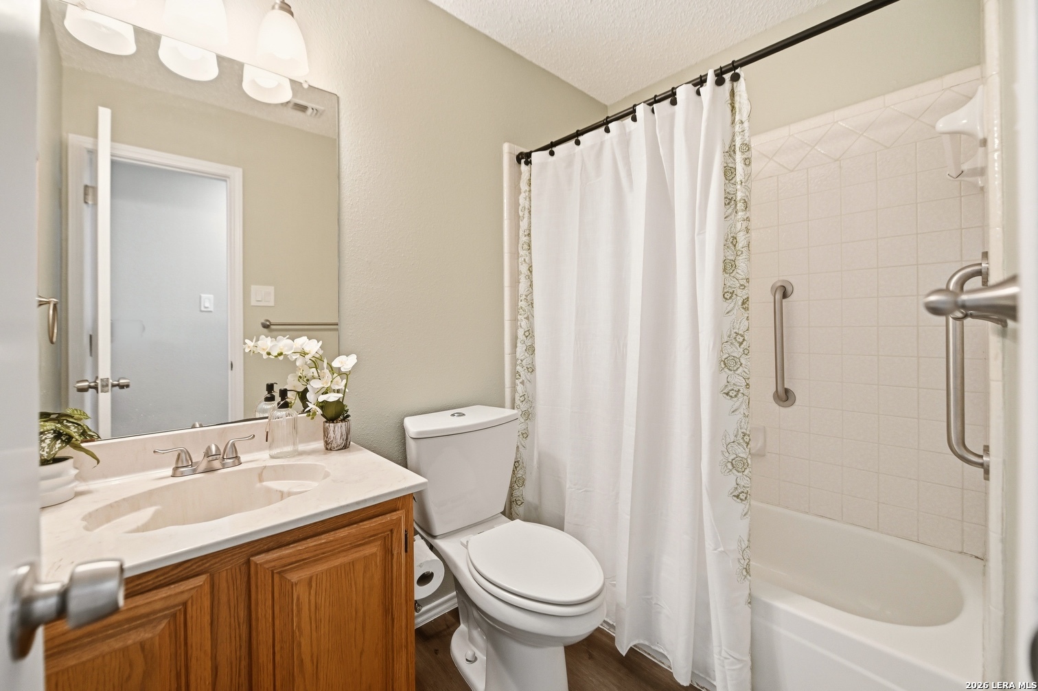 3820 Pheasant Schertz, TX 78108 - Photo 18 of 20 a bathroom with a sink toilet and shower