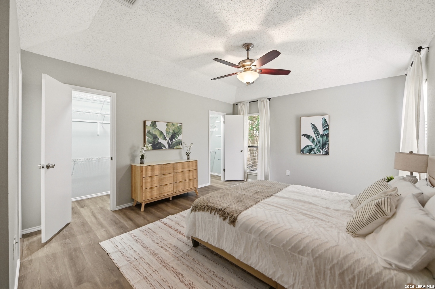 3820 Pheasant Schertz, TX 78108 - Photo 20 of 20 a bedroom with a bed and wooden floor
