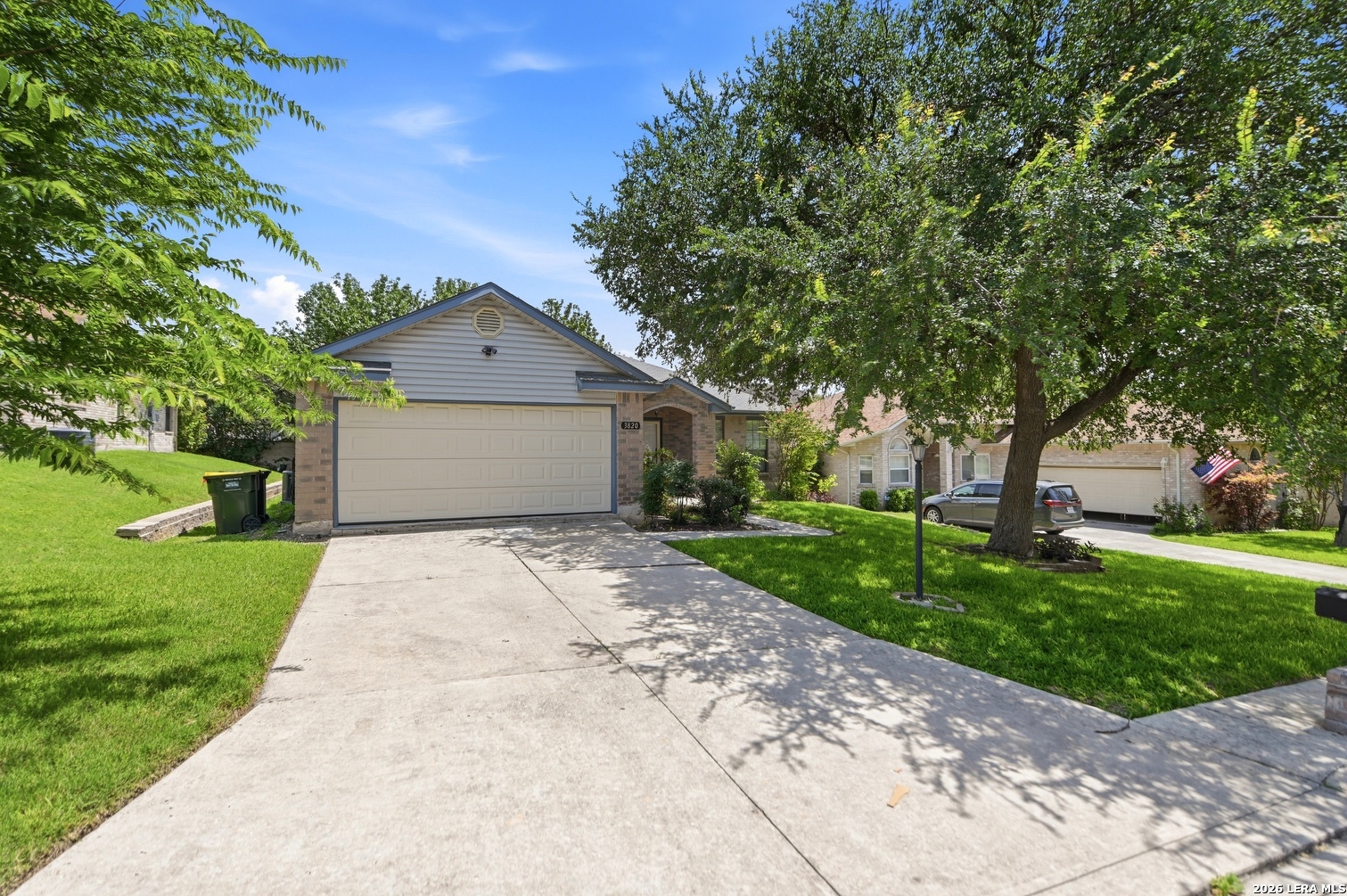 3820 Pheasant Schertz, TX 78108 - Photo 2 of 20 a front view of a house with a yard