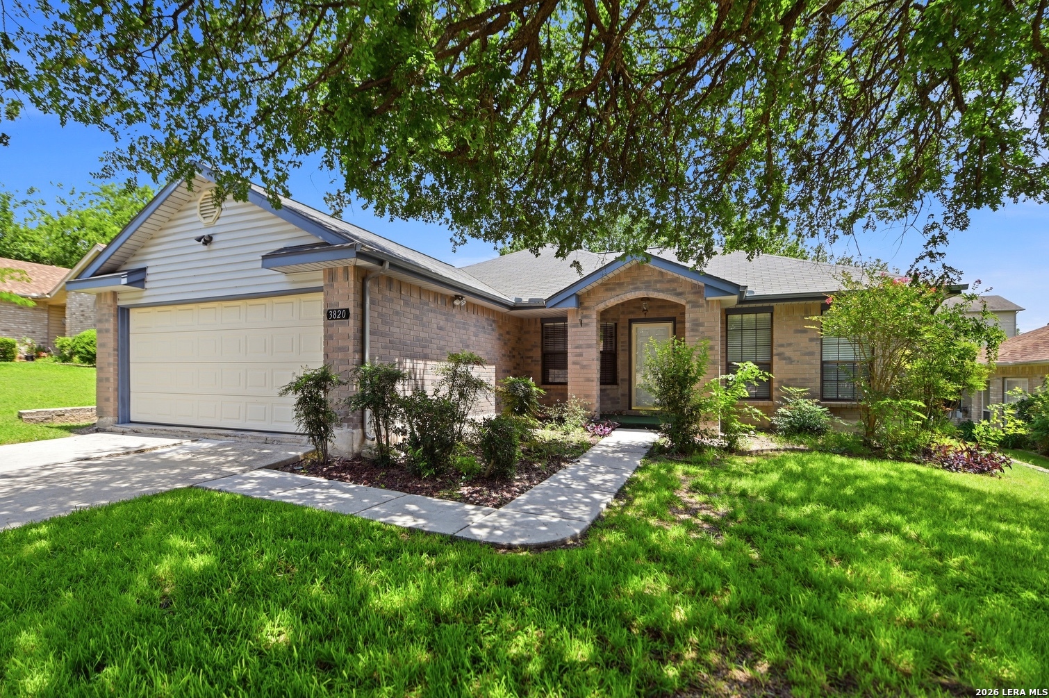 3820 Pheasant Schertz, TX 78108 - Photo 3 of 20 a front view of a house with a yard and porch
