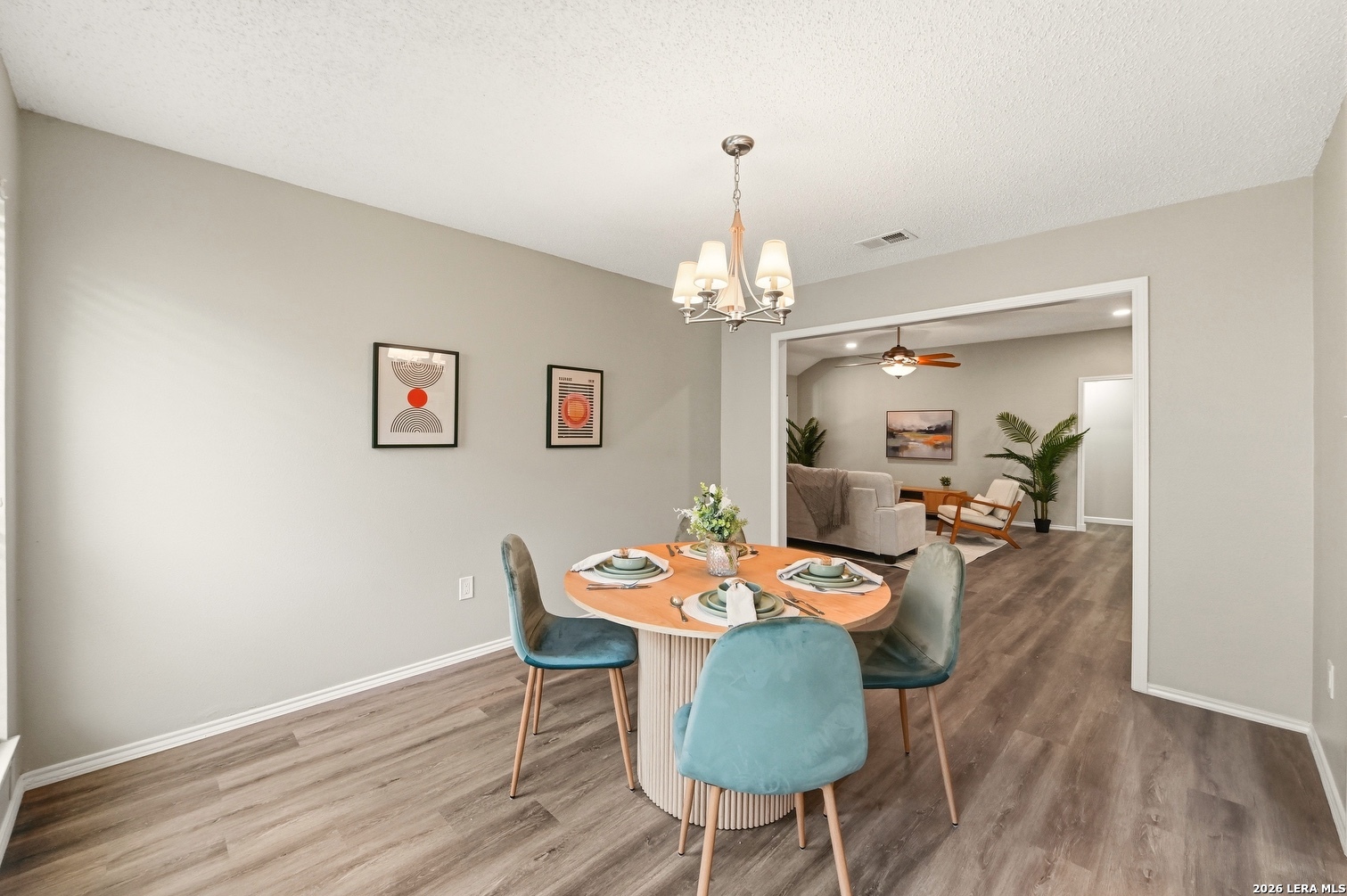 3820 Pheasant Schertz, TX 78108 - Photo 8 of 20 a view of a dining room with furniture and wooden floor