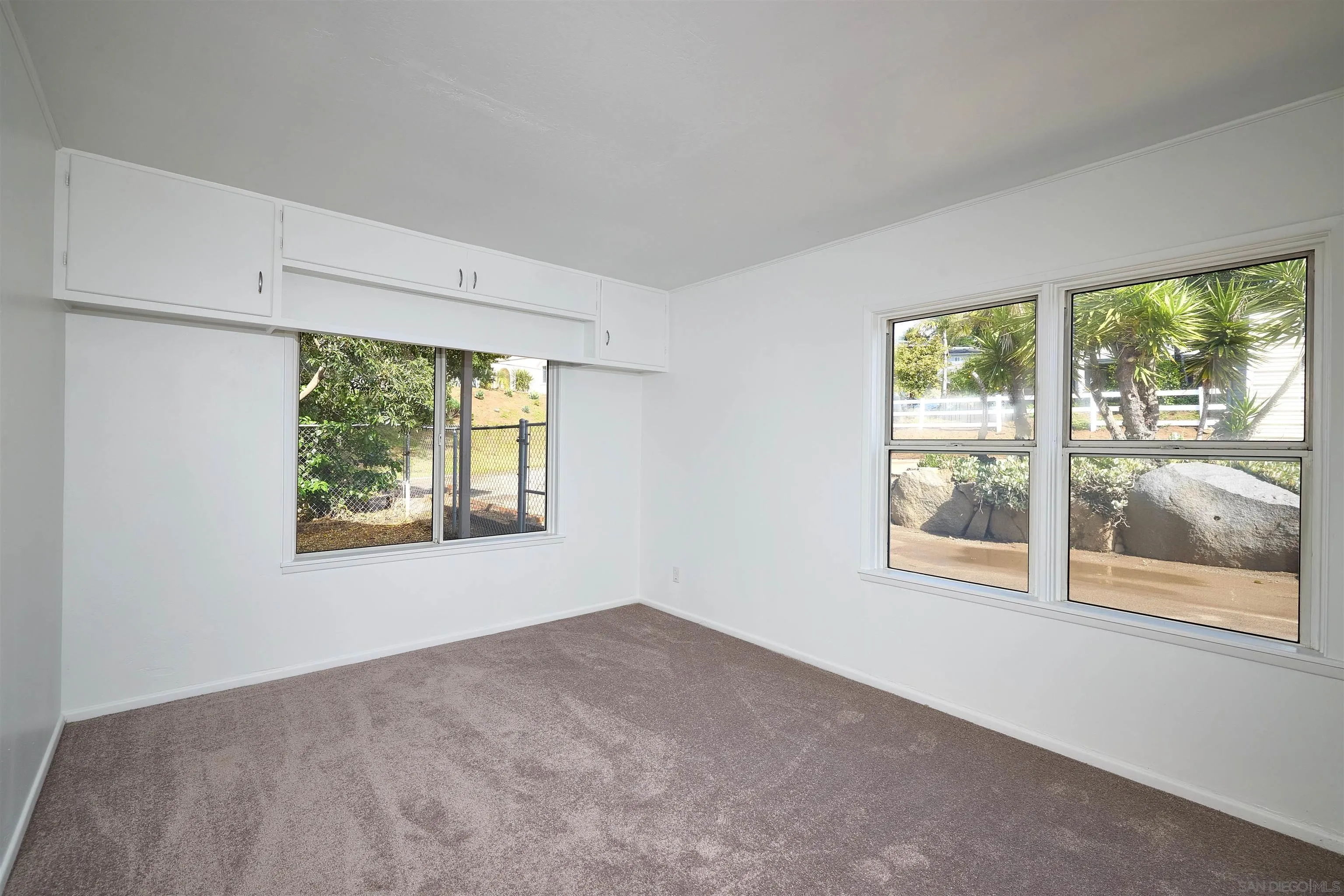 208 Avalon Drive Vista, CA 92084 - Photo 15 of 30 a view of an empty room with a window