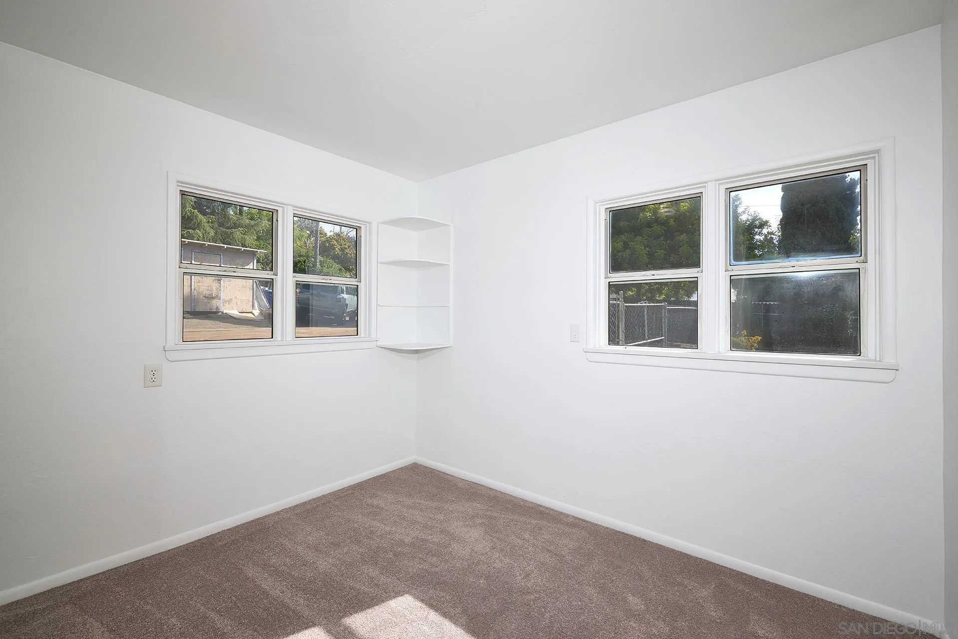 208 Avalon Drive Vista, CA 92084 - Photo 18 of 30 a view of empty room with windows