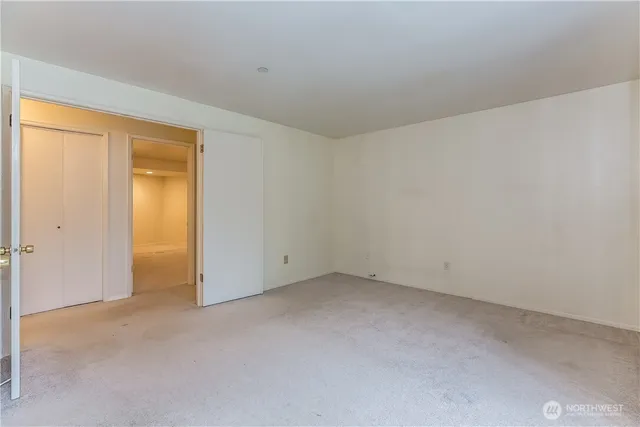 an empty room with closet