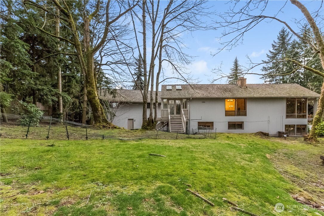 2 Cascade Key Bellevue, WA 98006 - Photo 22 of 24 a house view with a sitting space and garden