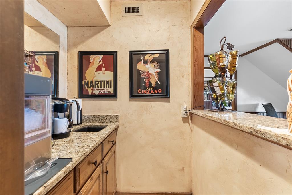 412 Pipeline Road Sulphur Springs, TX 75482 - Photo 20 of 40 Wet bar in the gameroom.