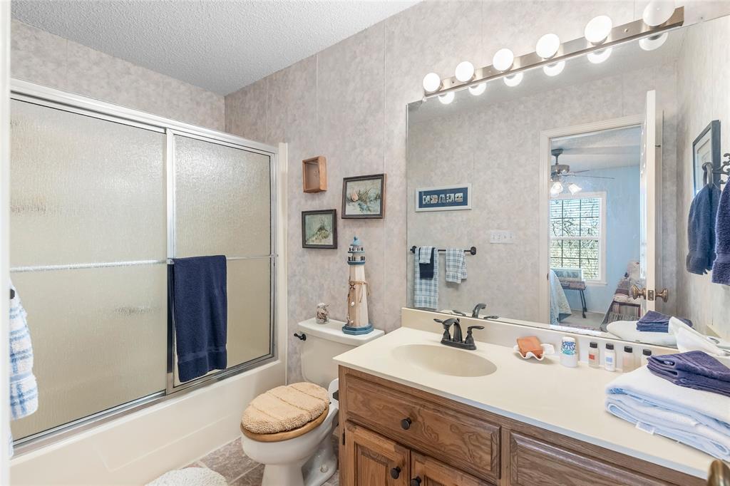 412 Pipeline Road Sulphur Springs, TX 75482 - Photo 27 of 40 Ensuite bath to guest bedroom 5.