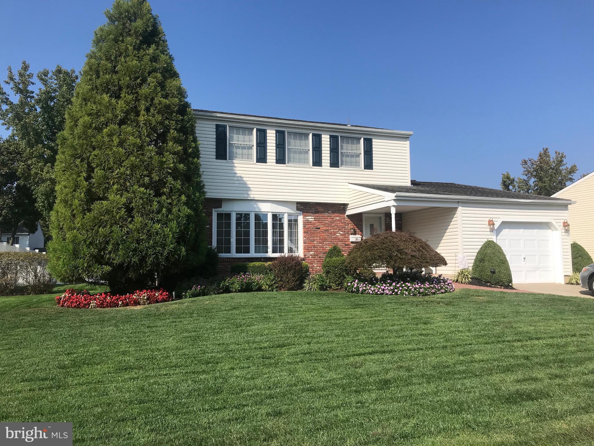 16 Vicksburg Road Laurel Springs, NJ 08021 - Photo 1 of 31 a front view of a house with a yard