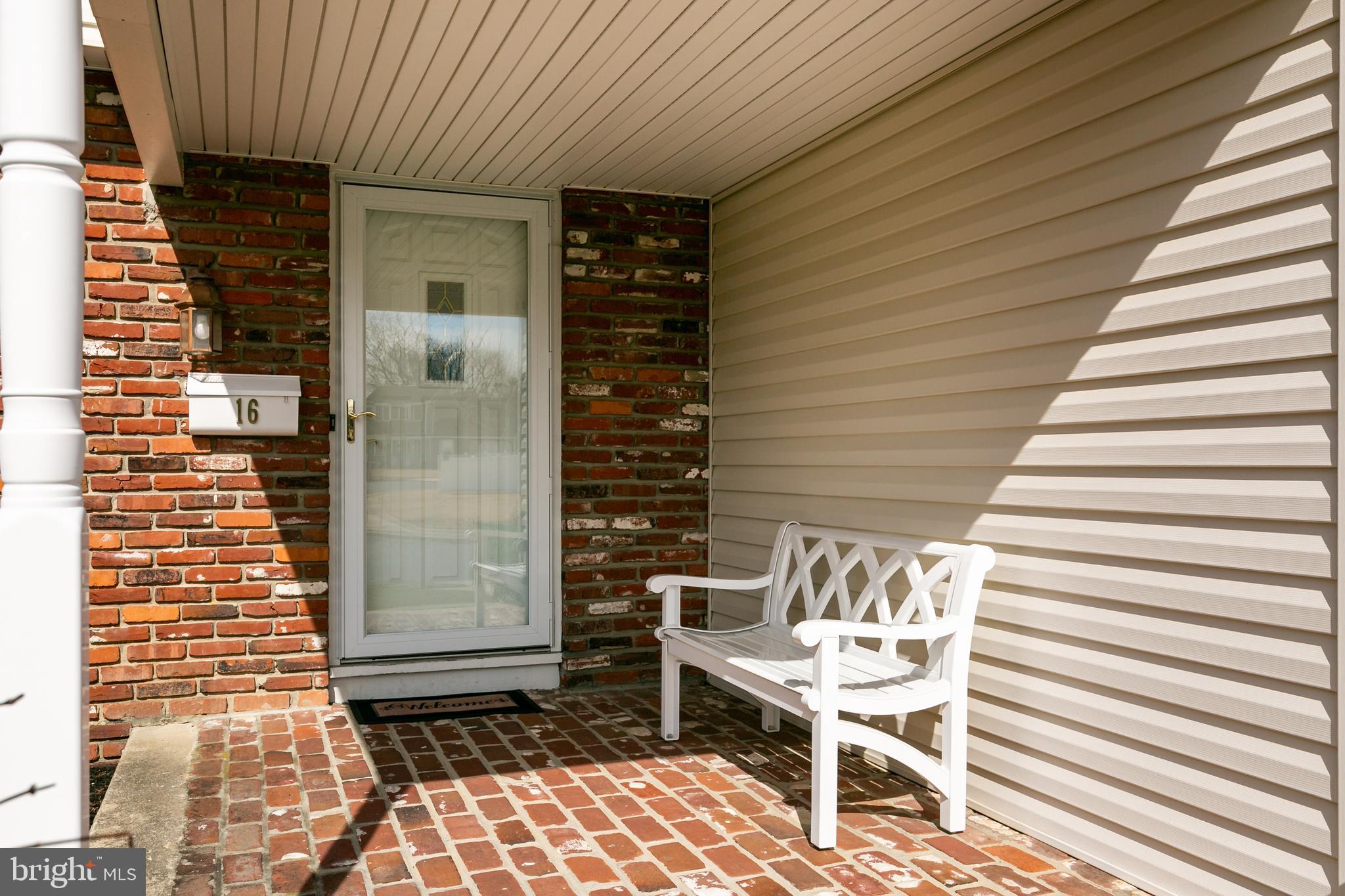 16 Vicksburg Road Laurel Springs, NJ 08021 - Photo 2 of 31 a couple of chairs sitting in front of a door