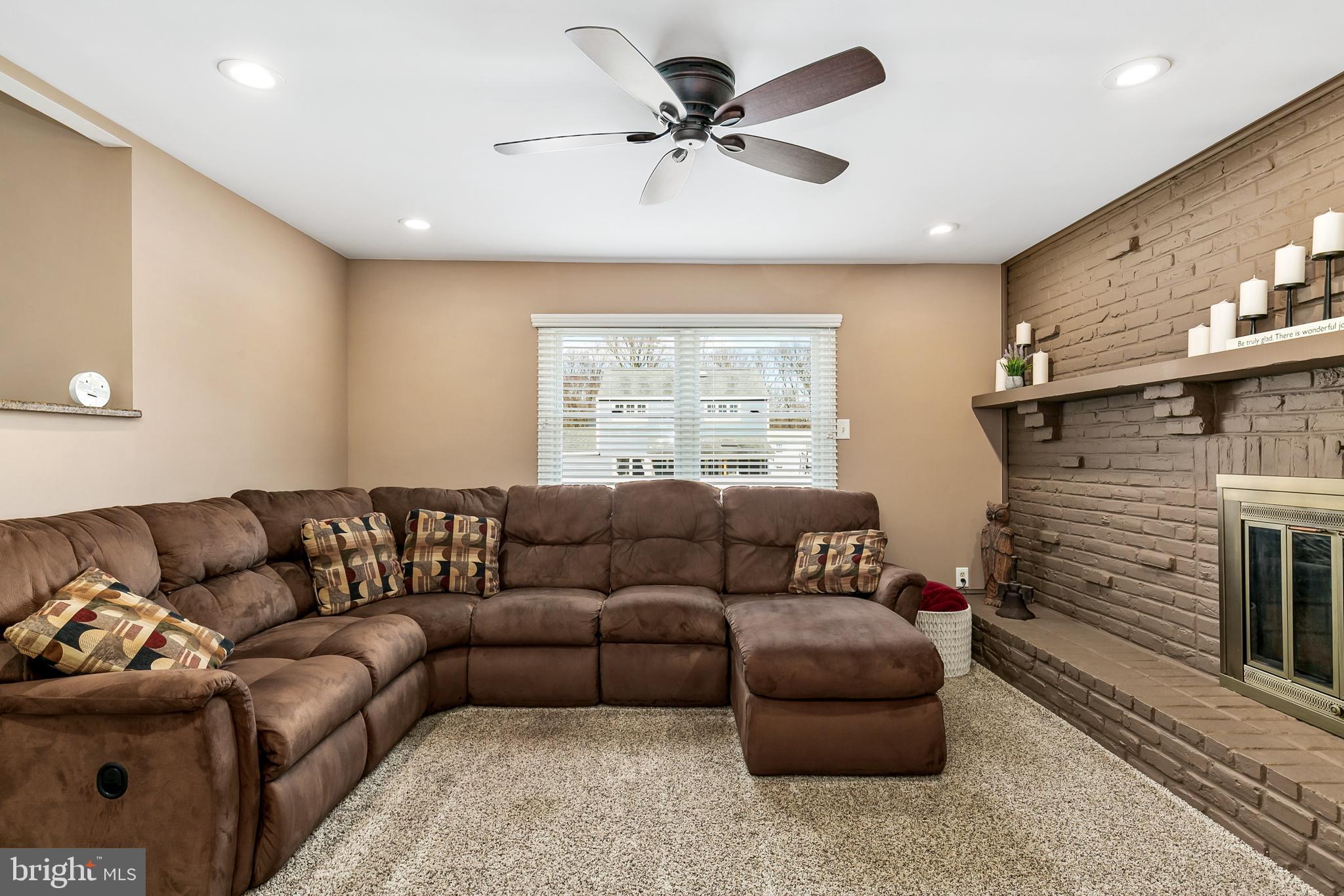 16 Vicksburg Road Laurel Springs, NJ 08021 - Photo 13 of 31 a living room with furniture a window and a couch