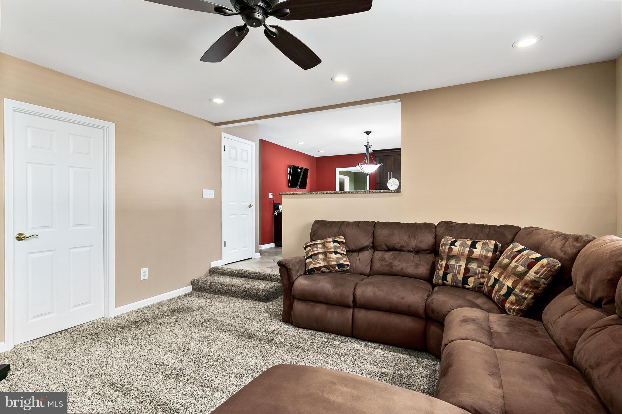 16 Vicksburg Road Laurel Springs, NJ 08021 - Photo 14 of 31 a living room with furniture and a rug