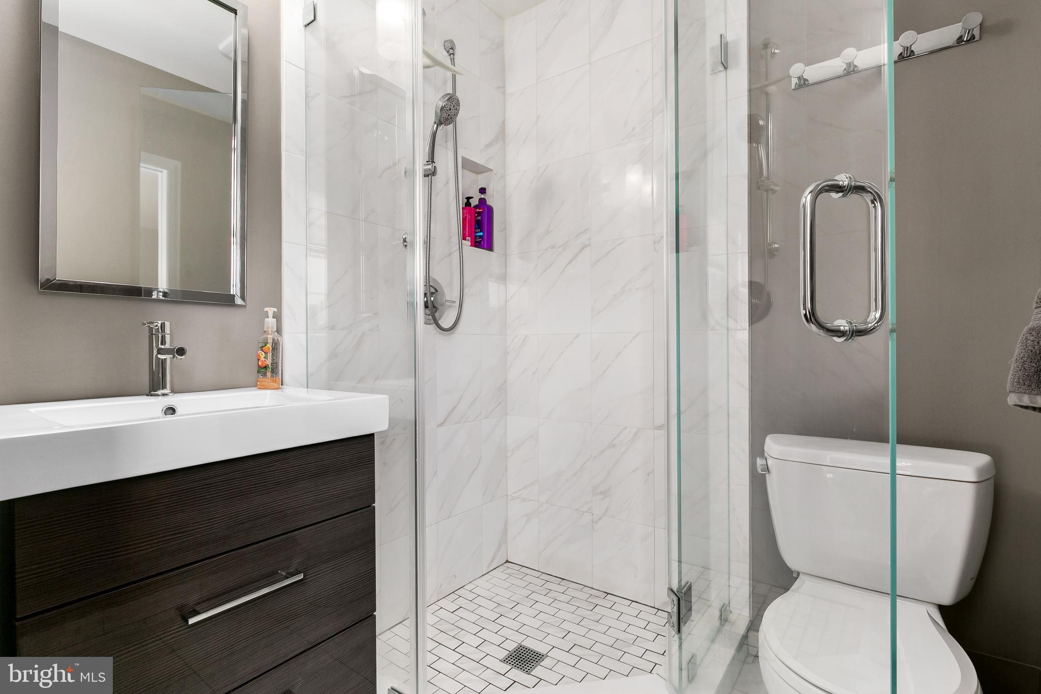 16 Vicksburg Road Laurel Springs, NJ 08021 - Photo 17 of 31 a bathroom with a toilet sink shower and mirror