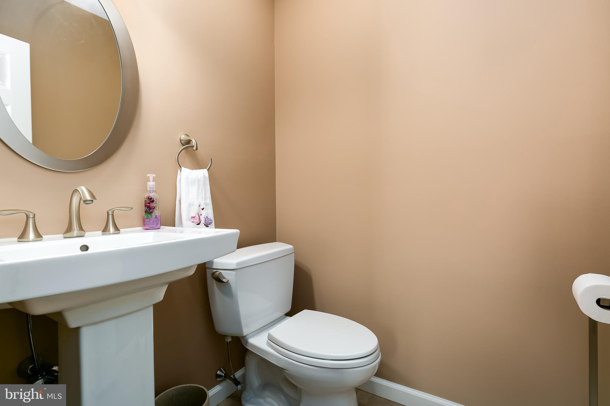 16 Vicksburg Road Laurel Springs, NJ 08021 - Photo 20 of 31 a bathroom with a sink mirror and toilet
