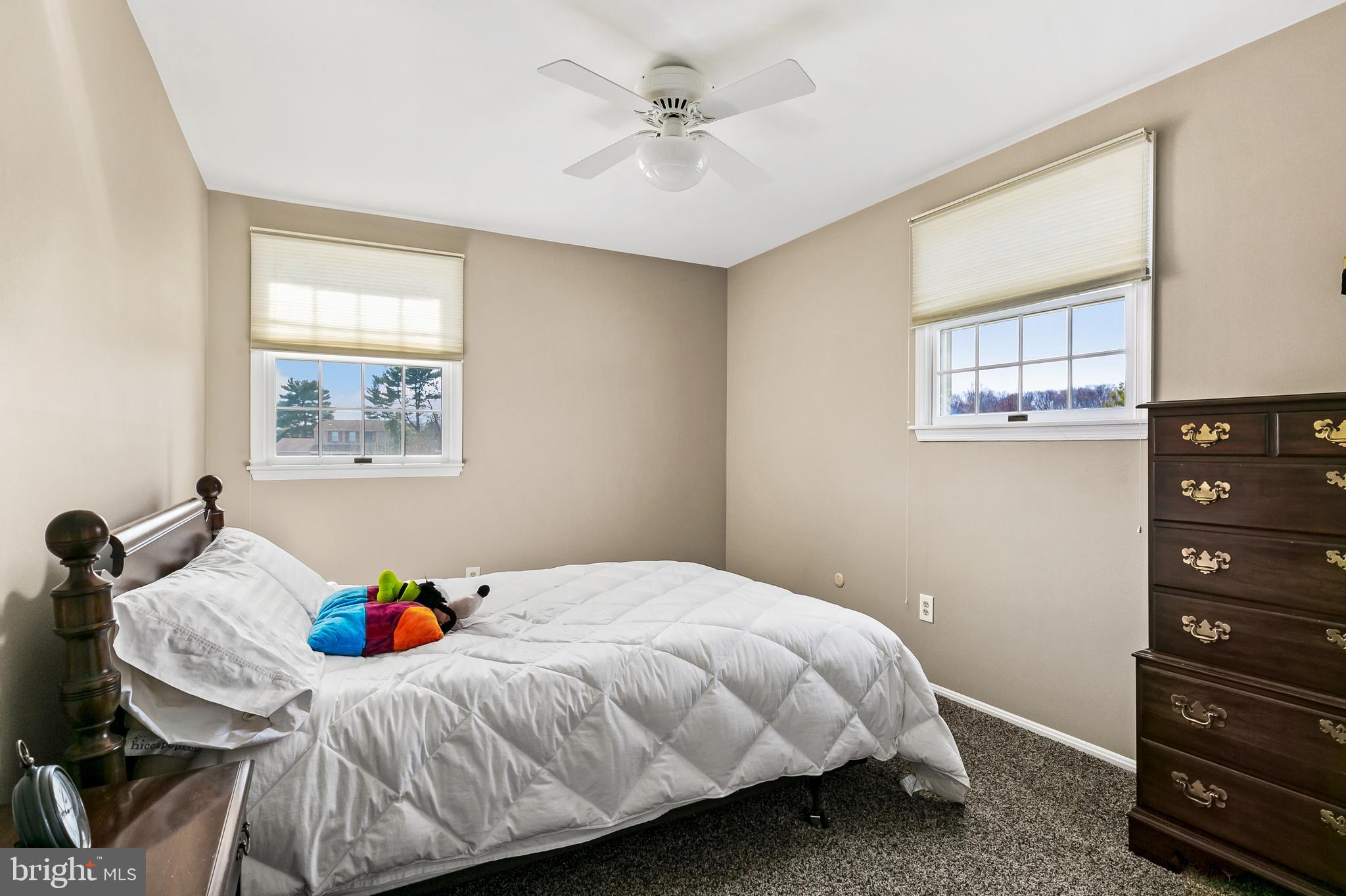16 Vicksburg Road Laurel Springs, NJ 08021 - Photo 21 of 31 a bedroom with a bed and wooden floor