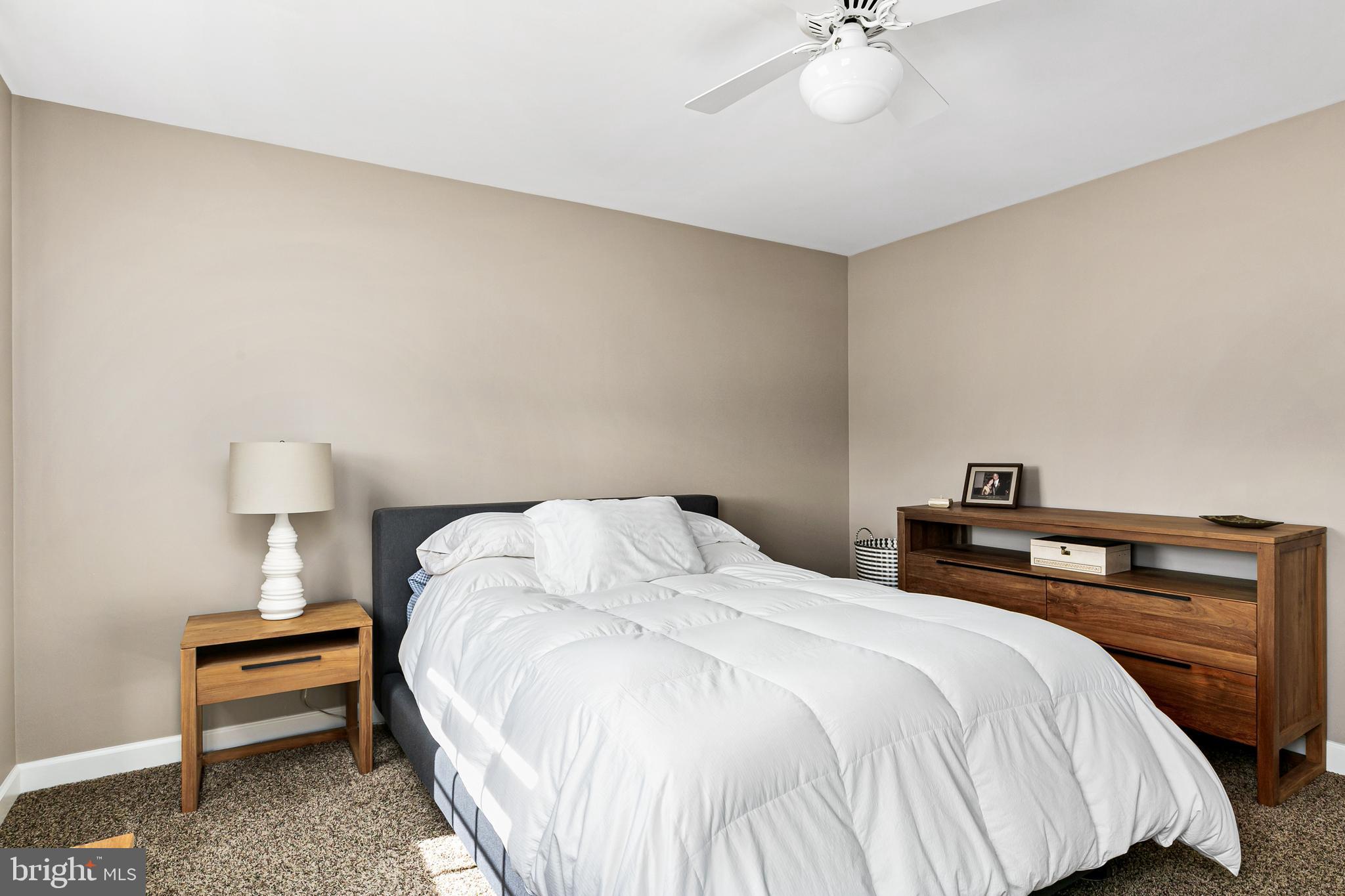 16 Vicksburg Road Laurel Springs, NJ 08021 - Photo 23 of 31 a bedroom with a bed and a ceiling fan