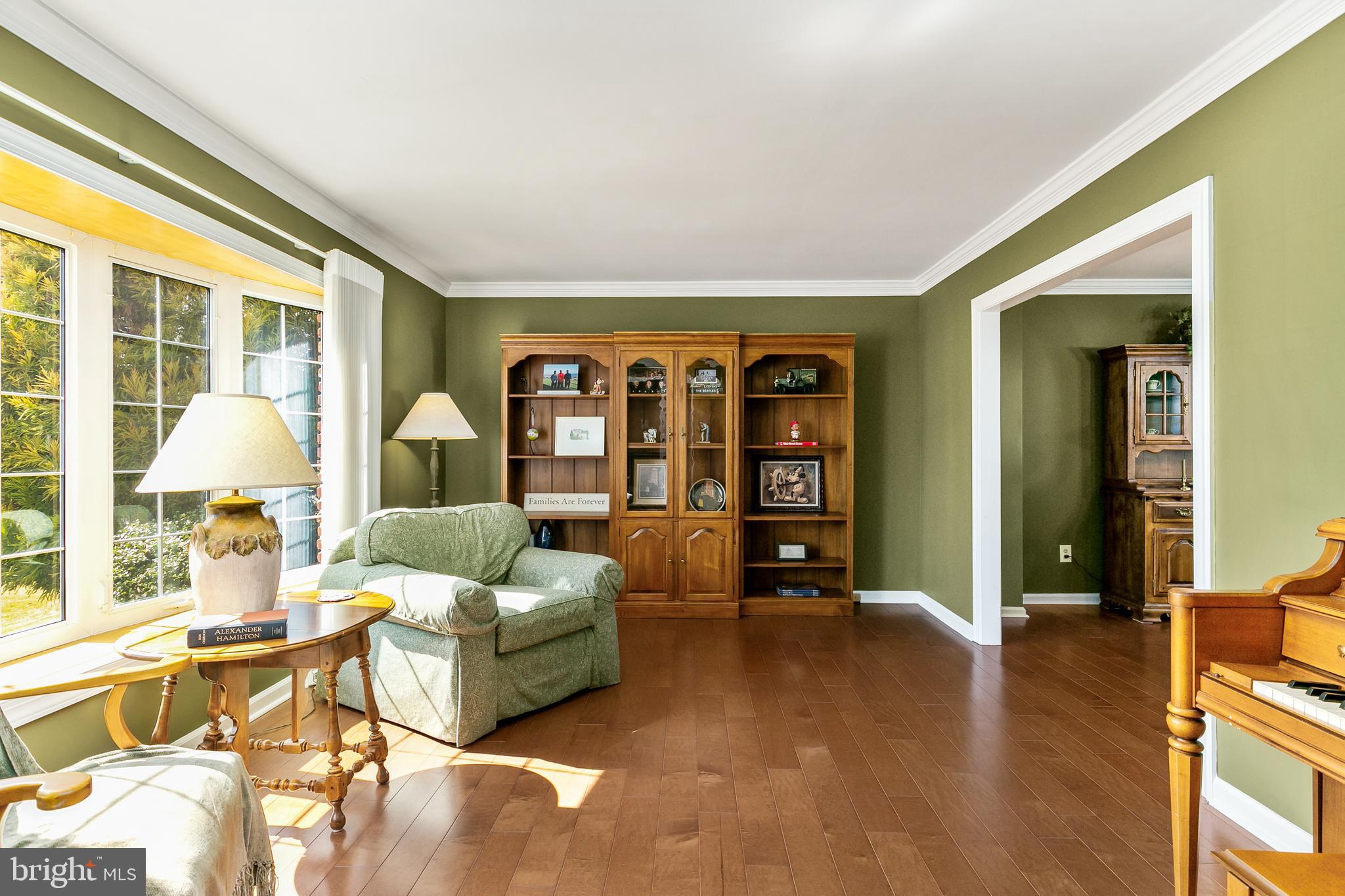 16 Vicksburg Road Laurel Springs, NJ 08021 - Photo 5 of 31 a living room with furniture and a large window