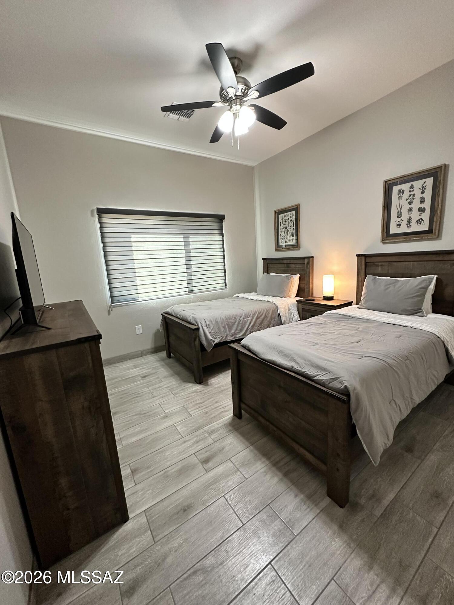 117 Ver Patria Rio Rico, AZ 85648 - Photo 12 of 28 a bedroom with double bed and a window