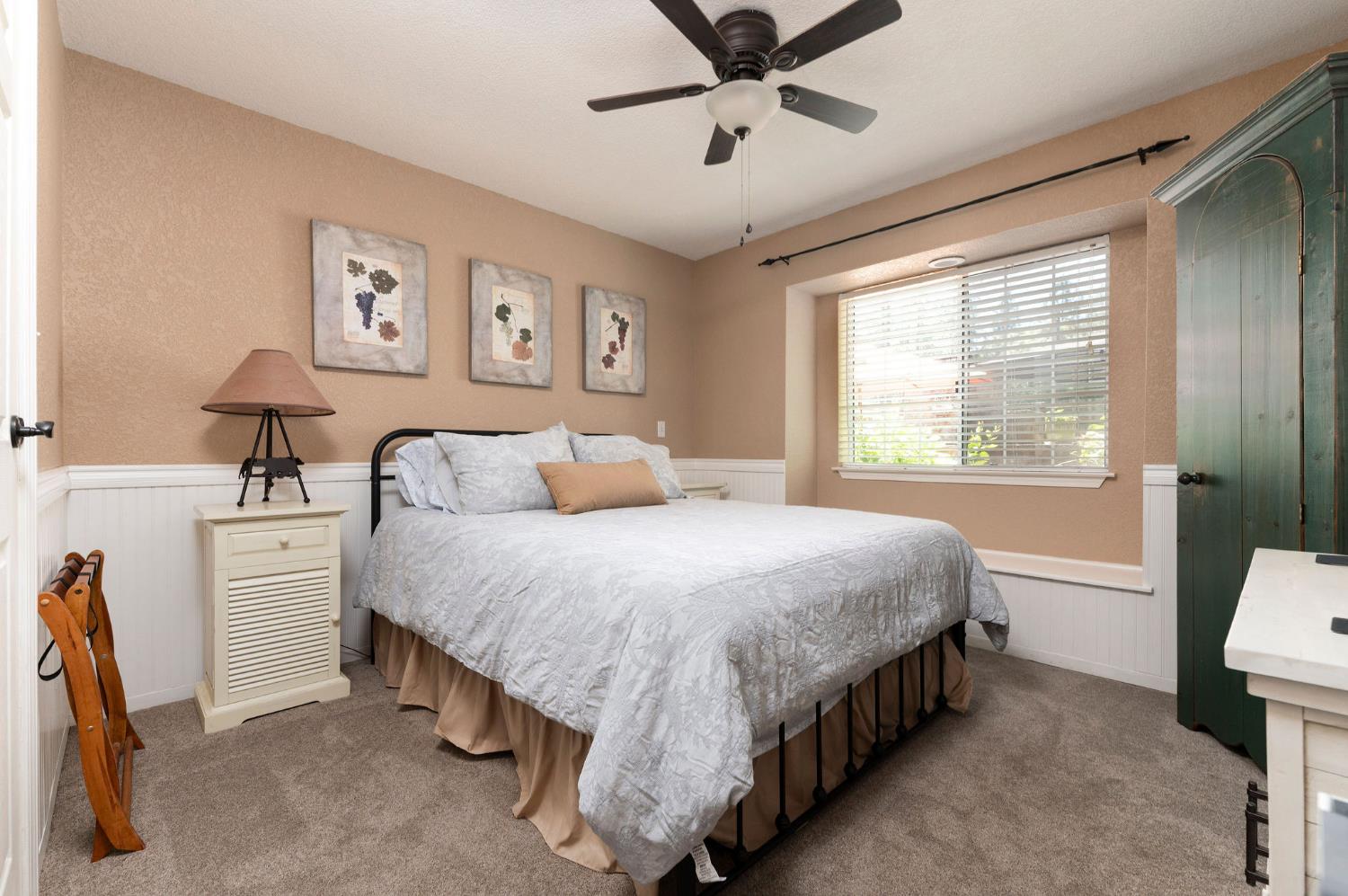 11266 Clinton Bar Road Pine Grove, CA 95665 - Photo 24 of 77 a spacious bedroom with a bed and a table