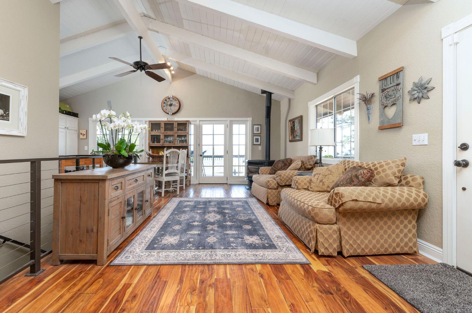 11266 Clinton Bar Road Pine Grove, CA 95665 - Photo 36 of 77 a living room with furniture and a chandelier