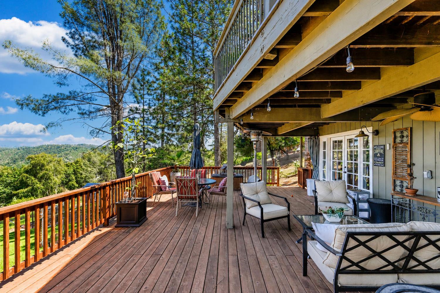 11266 Clinton Bar Road Pine Grove, CA 95665 - Photo 38 of 77 a view of a chairs and table in the balcony