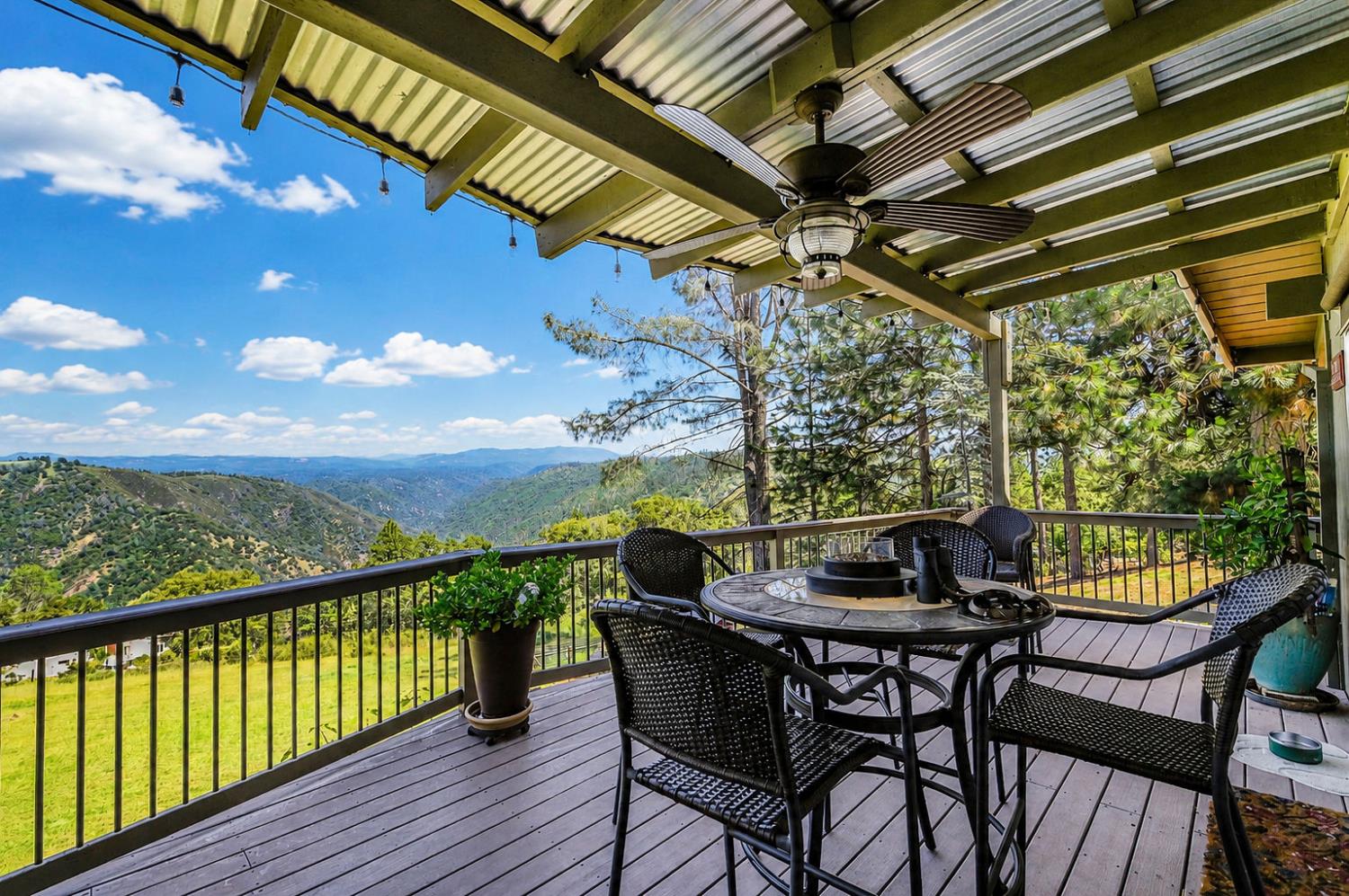 11266 Clinton Bar Road Pine Grove, CA 95665 - Photo 40 of 77 a view of balcony with furniture and wooden floor