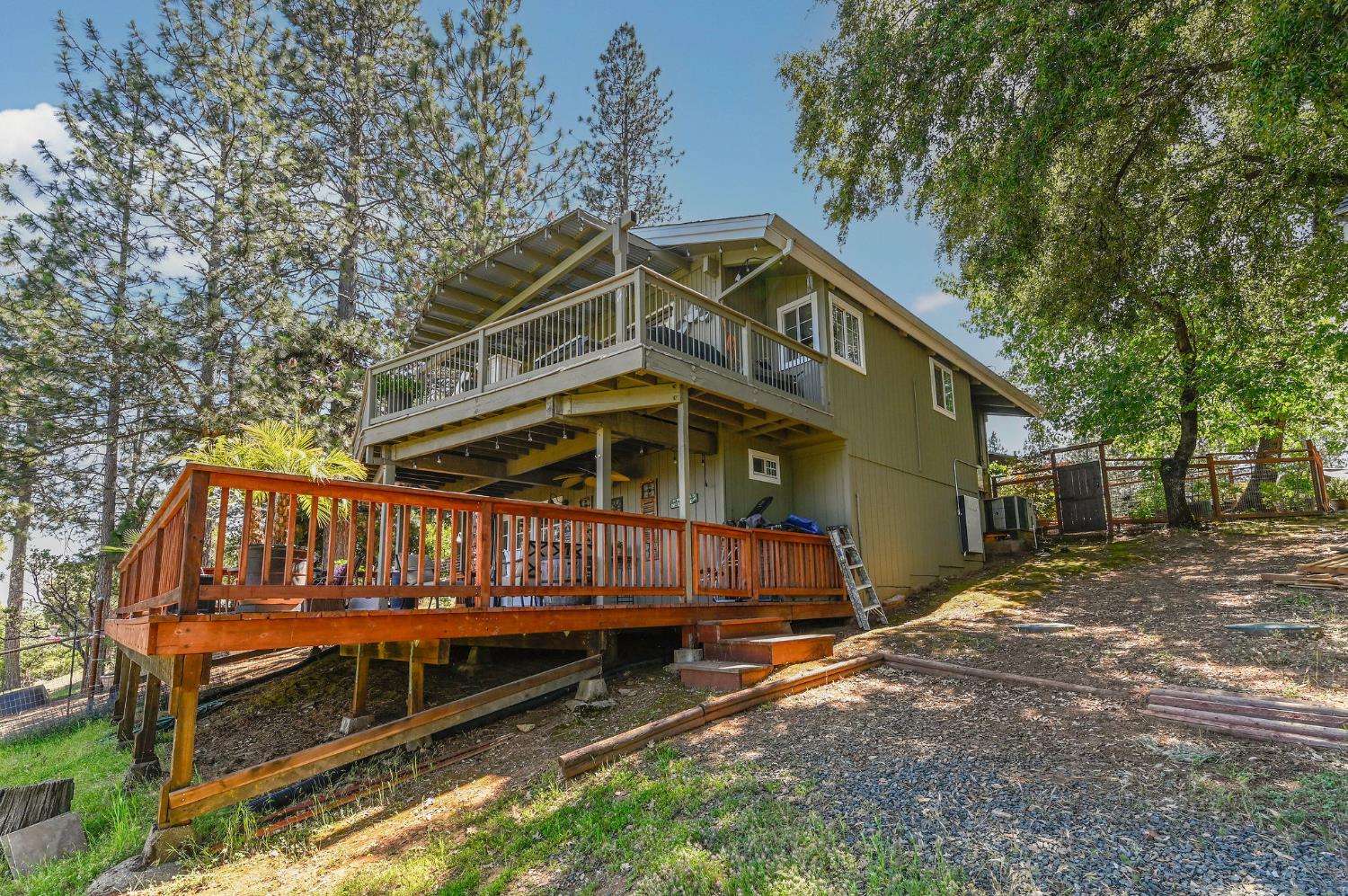 11266 Clinton Bar Road Pine Grove, CA 95665 - Photo 49 of 77 a view of a house with a yard