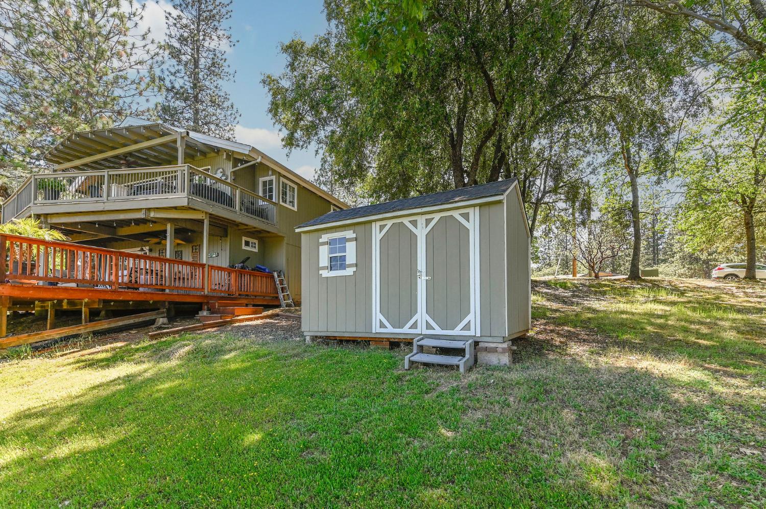 11266 Clinton Bar Road Pine Grove, CA 95665 - Photo 50 of 77 a view of a house with backyard and sitting area