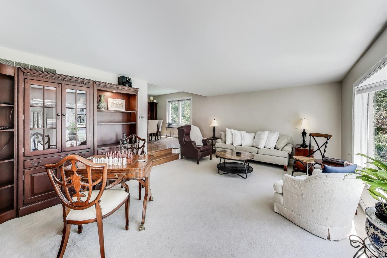 1804 East Apache Lane Mount Prospect, IL 60056 - Photo 10 of 27 a living room with furniture and a large window