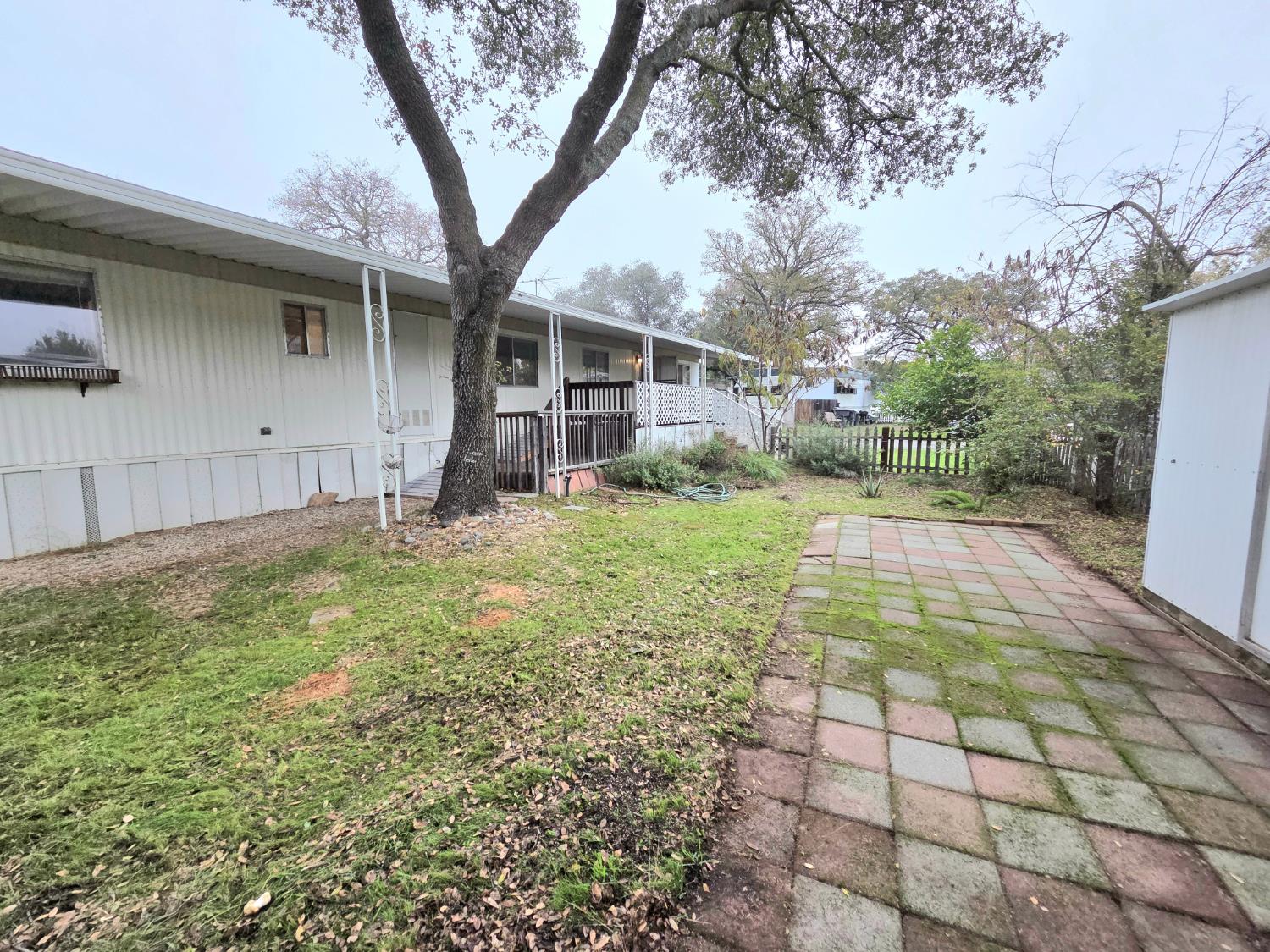 5200 Cavitt Stallman Road, Unit 18 Granite Bay, CA 95746 - Photo 18 of 20 a view of a house with a yard