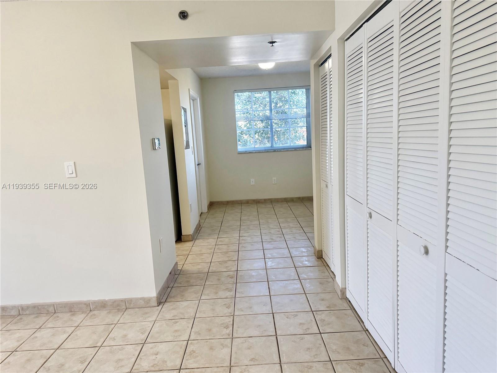 601 Southwest 37th Avenue, Unit 301 Miami, FL 33135 - Photo 12 of 22 a view of a hallway