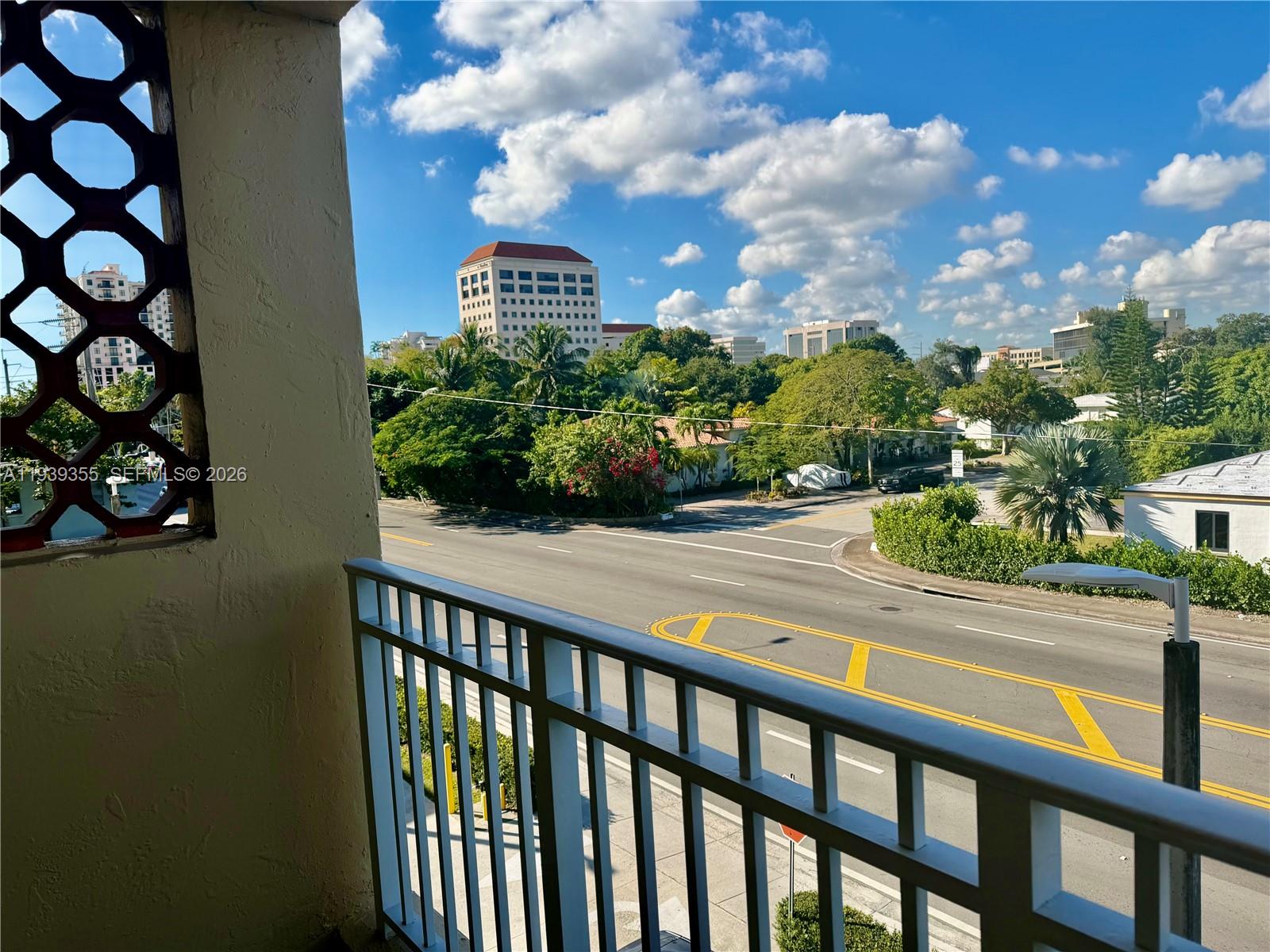 601 Southwest 37th Avenue, Unit 301 Miami, FL 33135 - Photo 15 of 22 a view of a street from a balcony