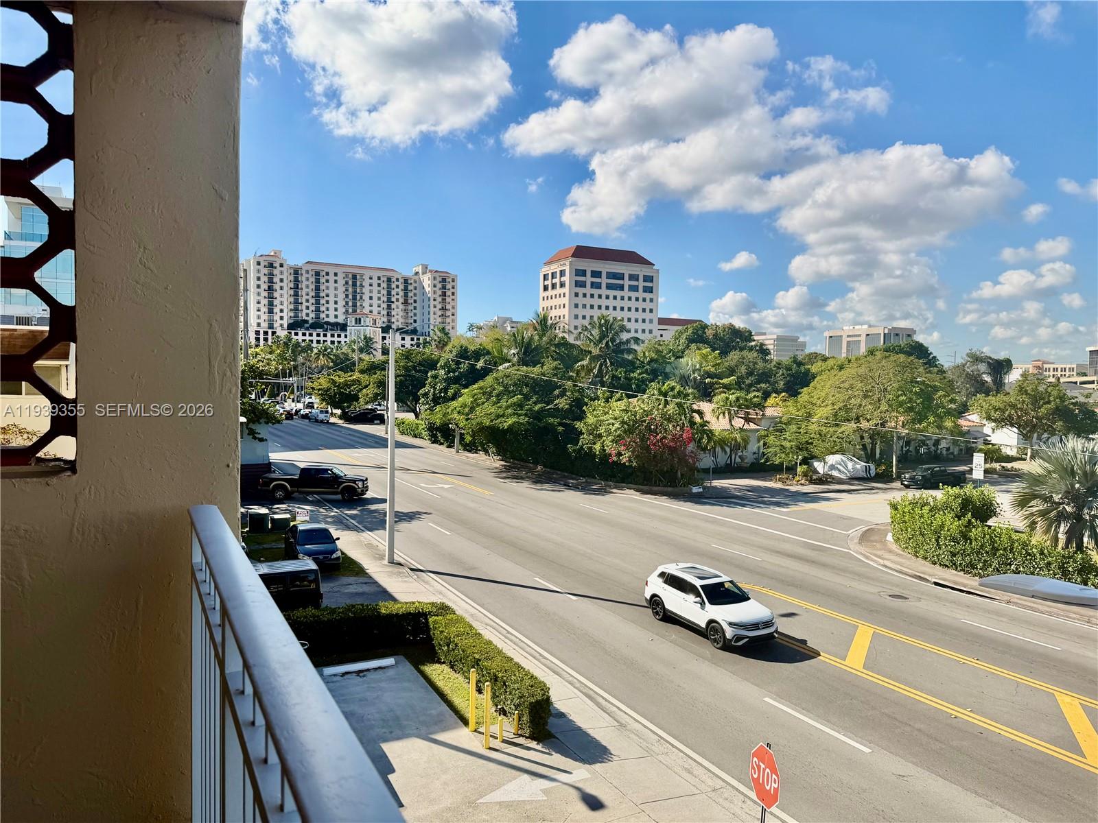 601 Southwest 37th Avenue, Unit 301 Miami, FL 33135 - Photo 16 of 22 a view of a street with cars