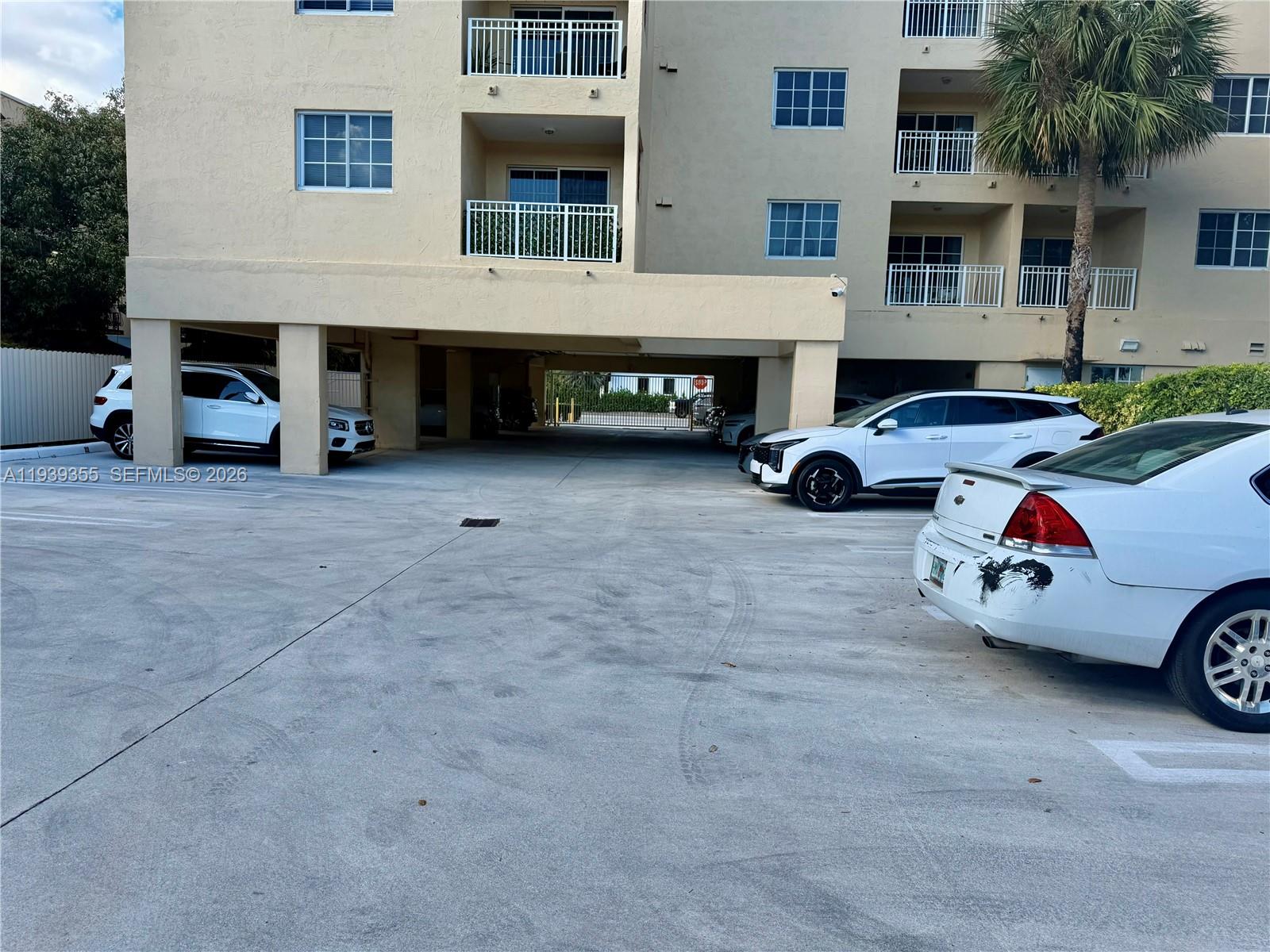 601 Southwest 37th Avenue, Unit 301 Miami, FL 33135 - Photo 17 of 22 a car parked in front of a building