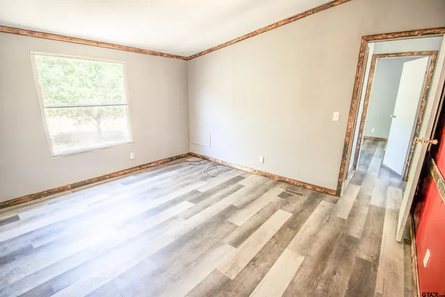 a view of a room that has a window in it