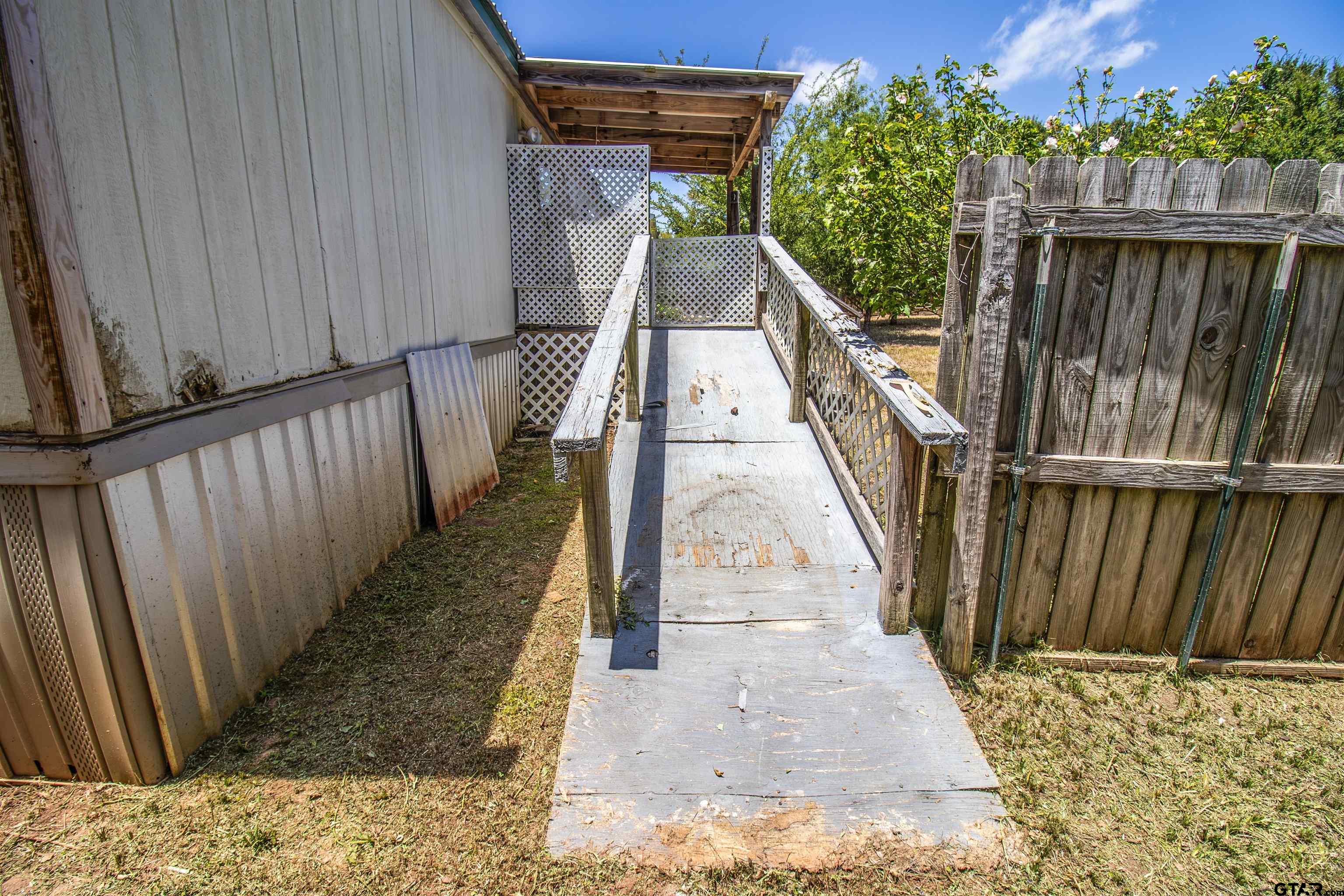 12450 Fannin Parkway Tyler, TX 75708 - Photo 29 of 39 a view of wooden balcony
