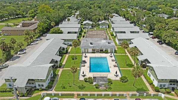 an aerial view of a house with a garden