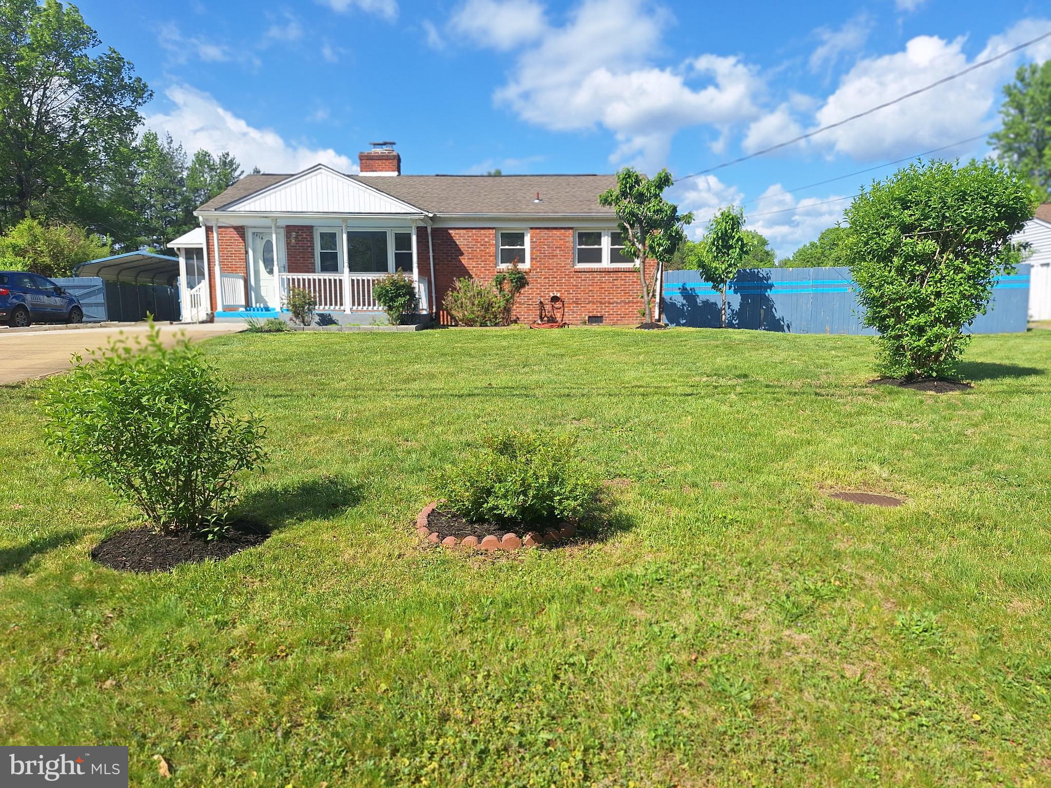 8816 Cooper Road Alexandria, VA 22309 - Photo 36 of 52 a front view of a house with garden