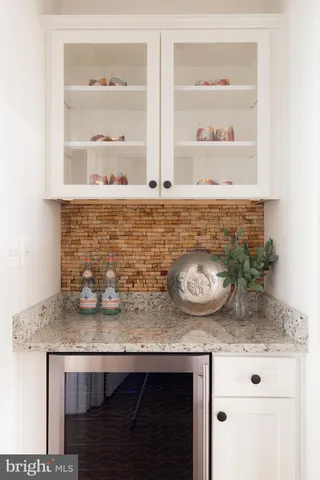 view of microwave with sink