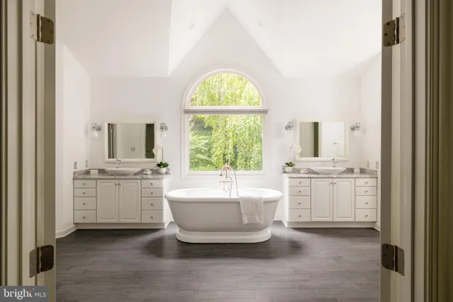a room with sink cabinets and window