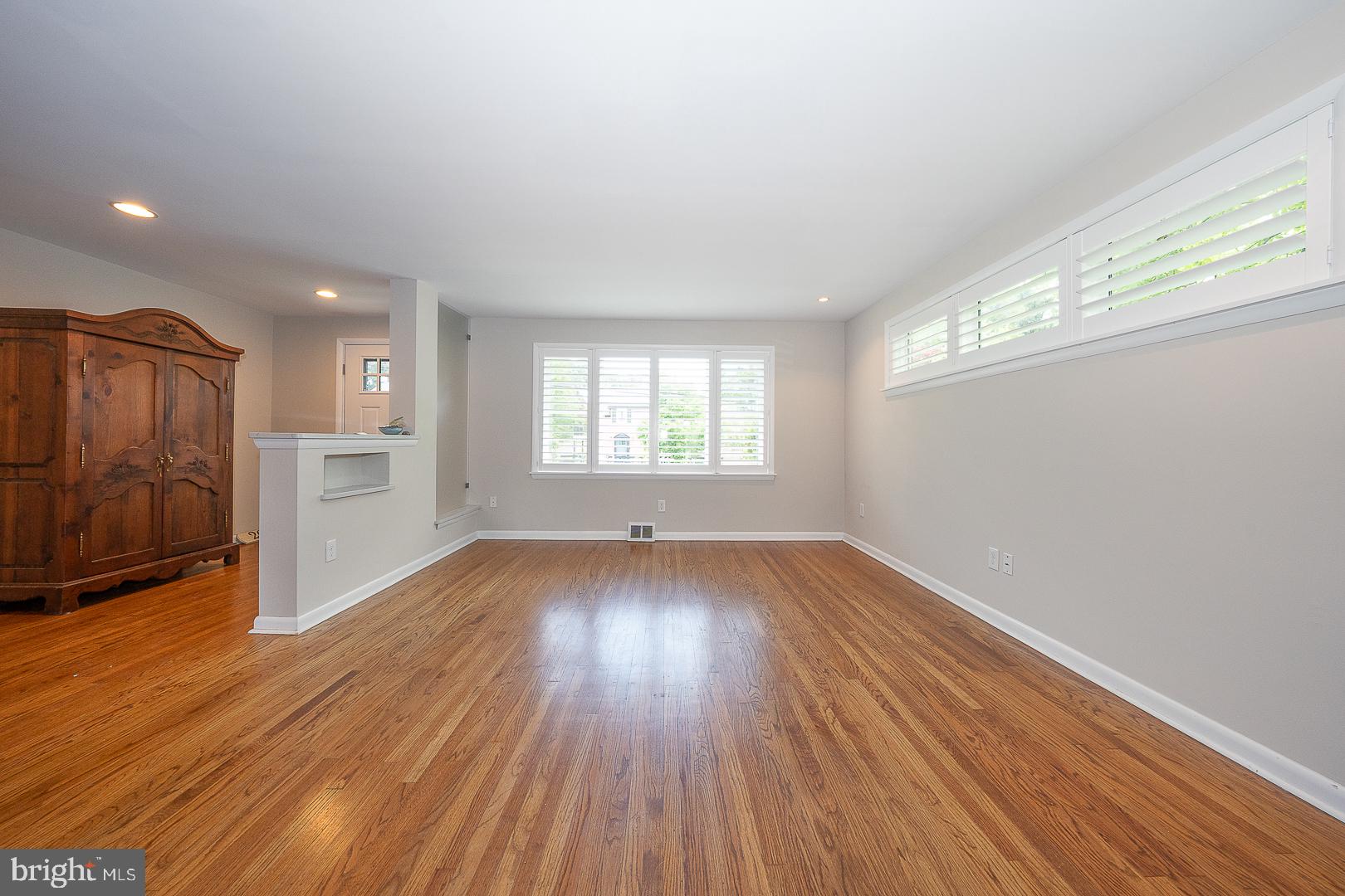 20 Fairview Road Swarthmore, PA 19081 - Photo 7 of 57 an empty room with wooden floor and windows