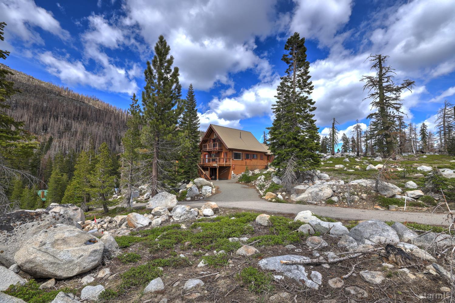 2051 Huckleberry Road Twin Bridges, CA 95735 - Photo 31 of 40 a view of a street with a yard